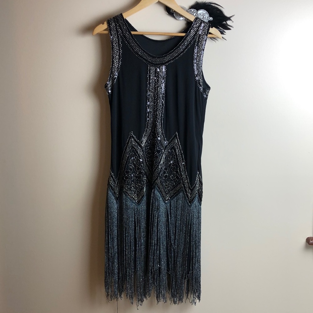 1920’s inspired black sequined flapper dress.